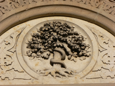 This carving of the Tree of Knowledge is on St. Johannis Kapelle (St. John the Baptist) Church in Mühldorf/Inn, Bavaria, Germany.